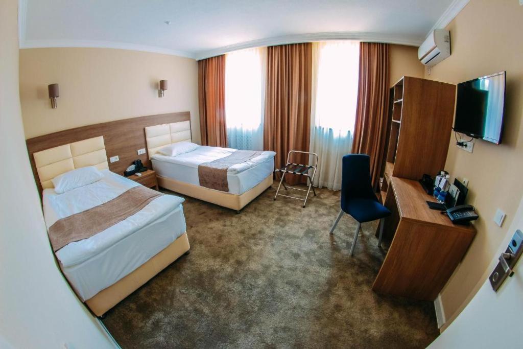 Osh Grand Hotel Chavo Extérieur photo